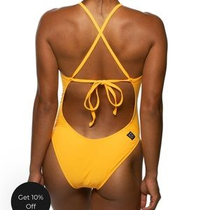 Jolyn Dayno 3 Onesie in Mango